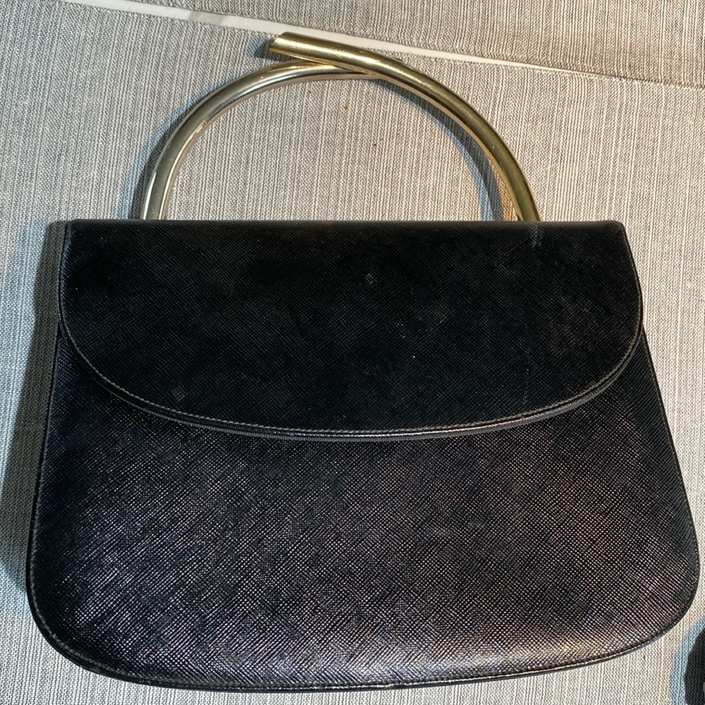 Never used. Vintage black leather purse made by Dorian